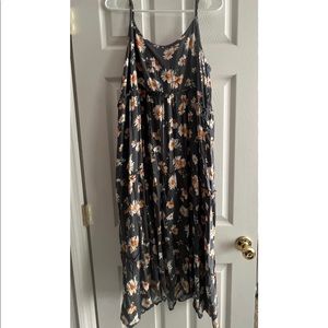 Large size dress from Maurice’s￼. Sunflower pattern. Never worn. Tag still on.